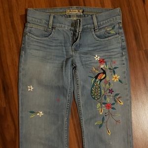 Embroidered jeans.